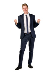 Happy young businessman raised fists isolated on white