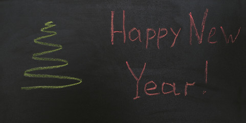 Childish Chalk Drawing on Blackboard New Year or Christmas Tree