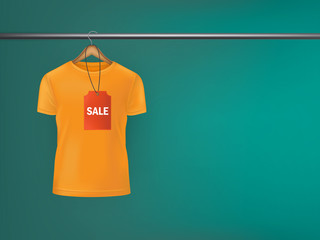 T-shirt with a price tag hanging on  hanger.