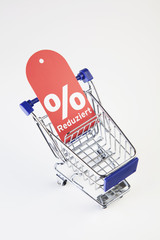 Einkaufswagen mit Prozentschild