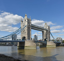Fototapeta na wymiar Tower Bridge with Clouds and Canary Wharf