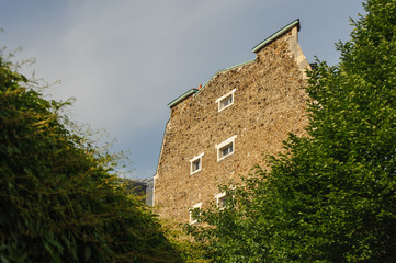 Fototapeta premium Brick wall of residential building in Paris
