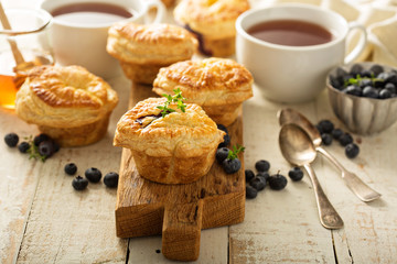 Puff pastries with cheese and berry filling