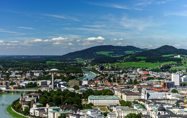 Fototapeta na wymiar Roofs of Salzburg, aerial view, summer day