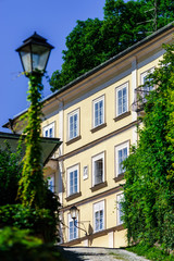 Fototapeta na wymiar Street, buildings and windows, old center of Salzburg