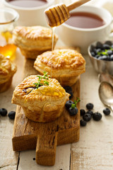 Puff pastries with cheese and berry filling