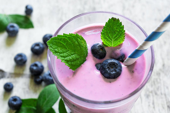 blueberry smoothie with fresh mint and ripe berries