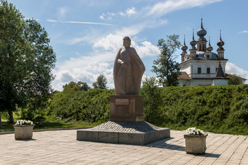 Golden Ring. Monument to Yury Dolgorukiy in Yuryev-Polsky against the background of Cathedral of the Archangel Michael