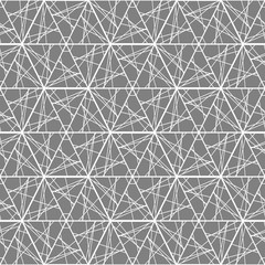 The geometric pattern of lines and triangles.