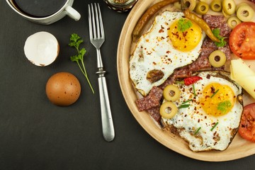 Fried Eggs on a plate. A hearty breakfast for athletes. Healthy food.

