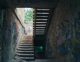 Staircase in an abandoned brick building destroyed