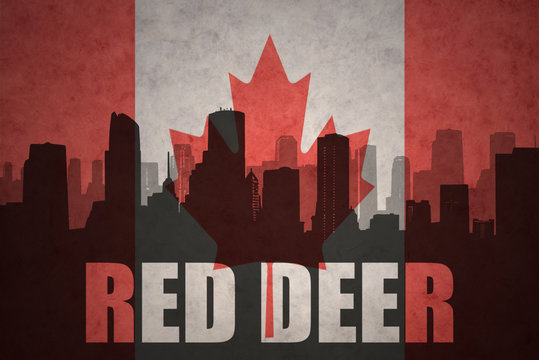 Abstract Silhouette Of The City With Text Red Deer At The Vintage Canadian Flag