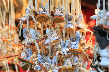 Colorful close up details of christmas fair market. Angels ball with a slice of orange decorations for sales.