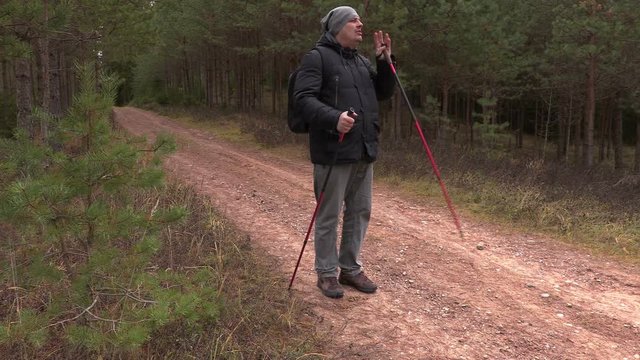 Man Call For Other People In Forest