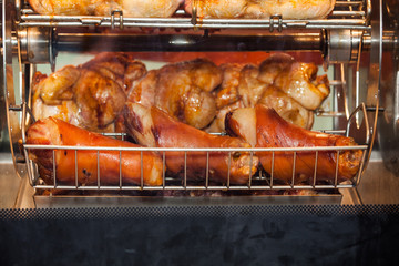 Grilled chicken in oven close up view