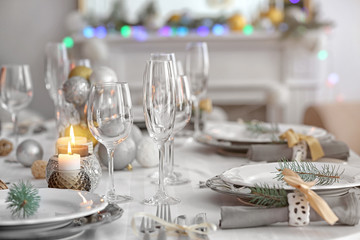 Table served for Christmas dinner in living room, close up view