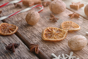 Christmas composition of natural decor on wooden background, close up view