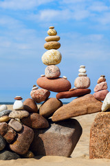 Concept of harmony and balance. Rock Zen on the beach