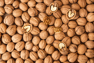 Walnuts background. Walnuts texture. Group walnuts on wooden bac