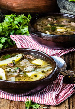 Traditional chilean latinamerican meat soup ajiaco served in clay plate