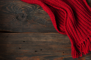 Fototapeta na wymiar Knitted red scarf