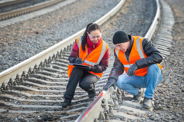 Railroad workers maintaing railways