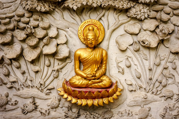 Traditional Thai style art sculpture on temple's wall