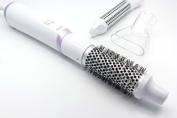 Collection electric hair dryer and hair curler in beauty salon, isolate on white background, Top view with copy space and text.