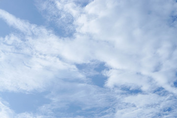 close up fluffy white cloud in sky at noon