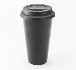 black colour cup coffee  with black tire lid