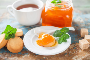 tea and jam on a table, selective focus, rustic style