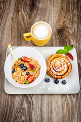 Fototapeta na wymiar Healthy breakfast on wooden background