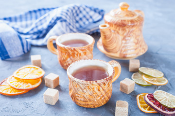 tea with a lemon on a table, selective focus