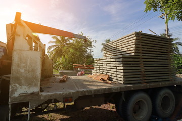 Sunshine effect, Stack of prestressed concrete slabs loaded on truck for construction
