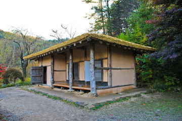 traditional straw thatched garden house / A view of traditional straw thatched garden house in Korea 