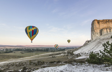 air baloons at sunrise near big White rock