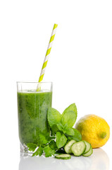 Green smoothie with cucumber,  mint, parsley and lemon as health