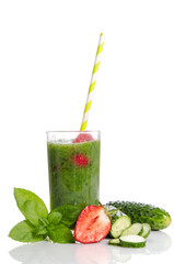 Green smoothie with cucumber,  mint, strawberry and parsley as h