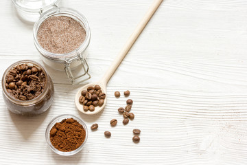 homemade coffee-sugar scrub top view wooden background