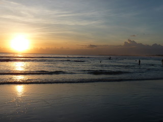 Beautiful sunset on the tropical sandy beach in Bali. Indonesia