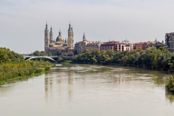 Fototapeta na wymiar Our Lady of the Pillar Basilica on Ebro River Zaragoza, Spain