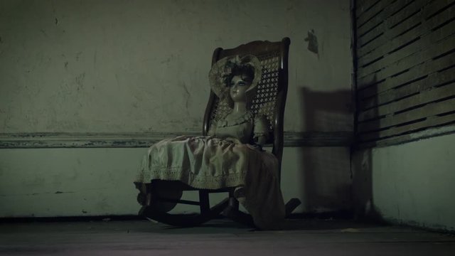 Creepy Doll Rocking in Chair