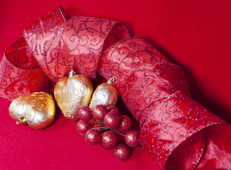 gold New Year's hearts and decorative ribbon