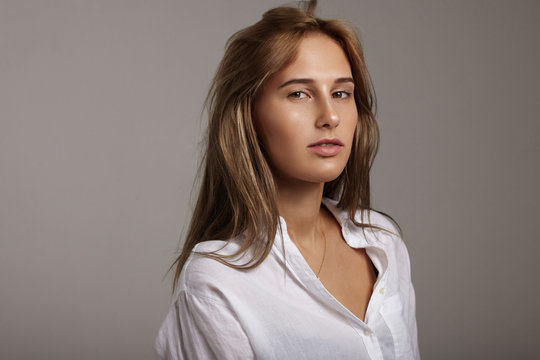 young woman;s portrait wears white man's shirt