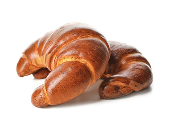 Two sweet tasty croissants, isolated on white