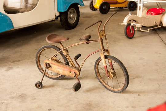 Old vintage bicycle for kid with rust on.
