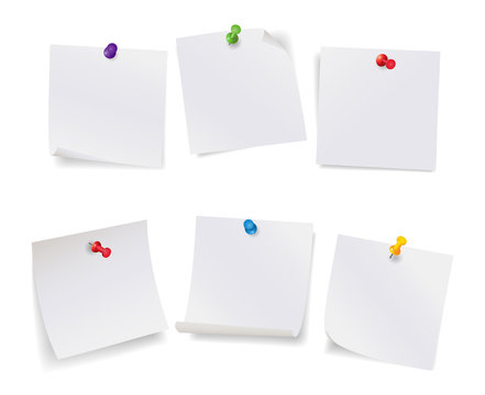 Set of white note papers with different color pushpins