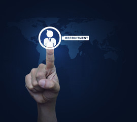 Hand pressing businessman with magnifying glass icon over digita