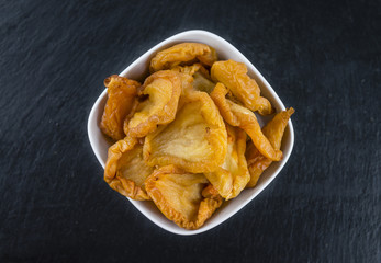 Dried Pears (close-up shot) on a slate slab