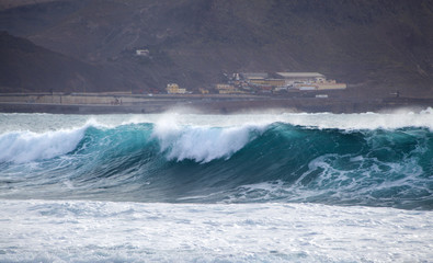 ocean wave breaking by Confital beach, north East of Gran Canari